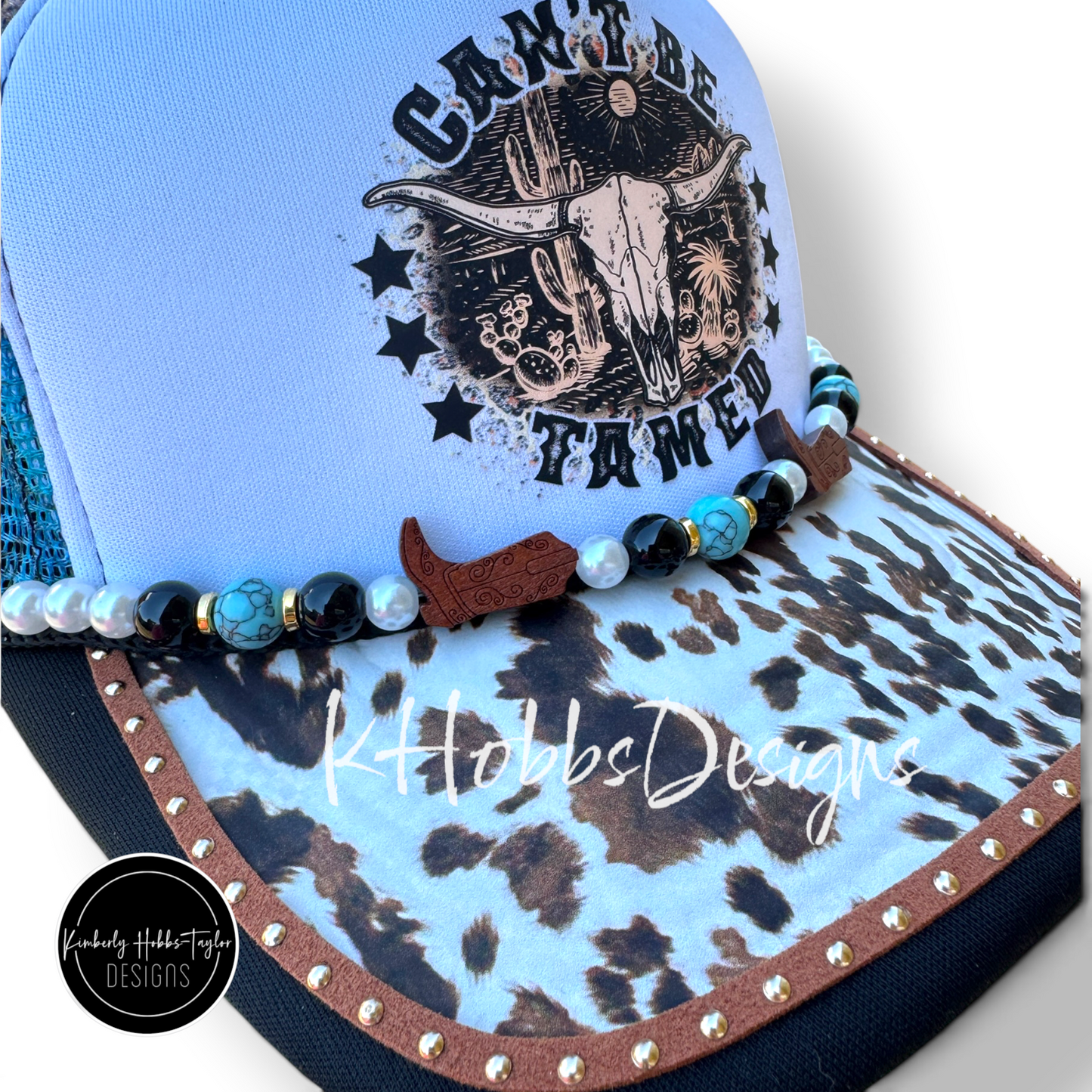 Can’t Be Tamed Trucker Hat